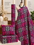 Fuchsia Labyrinth African print cotton fabric in pink, black and white, featuring angular blocks, spirals and patchwork-like panels; shown draped and folded.
