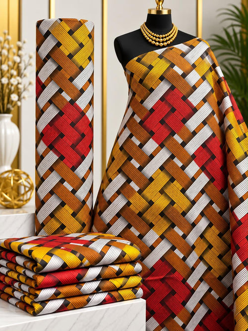 Amber Interlace African print cotton fabric in yellow, rust, white and black, featuring bold diagonal interwoven ribbon-like bands; shown draped and folded.