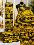 Golden Pathways African print cotton fabric in yellow and black, featuring horizontal rows of chevrons, loops and linear geometric motifs; shown draped and folded.