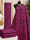 Magenta Markwork African print cotton fabric in pink and black, featuring rectangular panels of angular lines, triangles and zigzags; shown draped and folded.