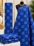 Cobalt Crowns African print cotton fabric in blue, yellow, white and black, featuring small repeated crown-like angular marks and fine vertical accents; shown draped and folded.