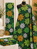Forest Petals African print cotton fabric in green, yellow and white, featuring scattered flower-like medallions on a dark green ground; shown draped and folded.