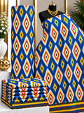 Royal Diamonds African print cotton fabric in blue, yellow, red and white, featuring large repeating concentric diamonds; shown draped and folded.