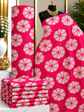 Rose Citrus African print cotton fabric in pink and cream, featuring large circular segmented floral motifs; shown draped and folded.